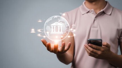 A man holding a mobile phone while displaying a digital banking system with a glowing effect. This image depicts innovation in financial technology.
