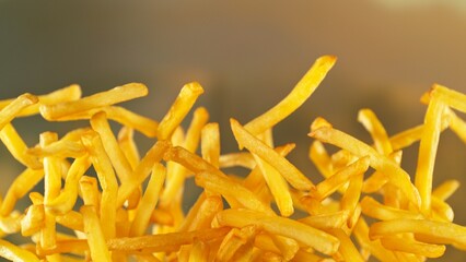 French Fries , Fried Potatoes Flying up in the Air . Concept of Junk Food