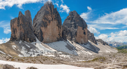Tre Cime di Lavaredo peaks in the Dolomites mountains with snow patches, Cortina d'Ampezzo,...