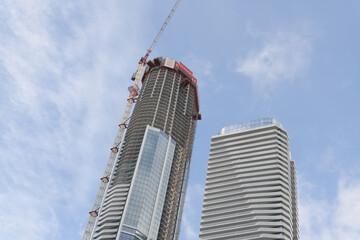 Fototapeta premium skyward view of SkyTower, a condominium complex, at Pinnacle One Yonge, Toronto