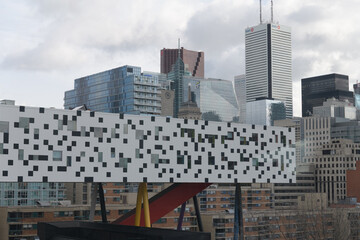 Fototapeta premium view outside Art Gallery of Ontario (exterior staircase) to the downtown core, financial district, and OCADU building on stilts, Toronto