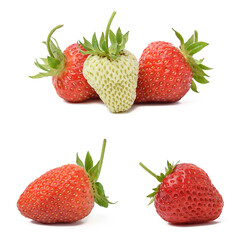 Ripe and unripe strawberries on a white isolated background
