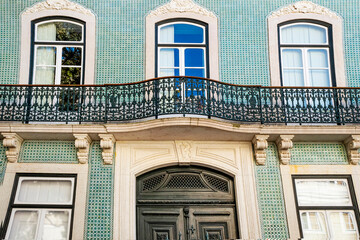 Obraz premium Beautiful and luxury building's facade from XIX Century in the Avenida da Liberdade, Freedom Avenue, known as the “Champs-Élysées of Lisbon,” where expansive brands are concentrated, Portugal, 2023