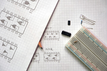 Building digital circuits with 74-series ICs and breadboard. Breadboard prototyping of fundamental logic gates and simple digital systems.