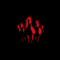 Red silhouette of horses galloping in a dark background during a sunset