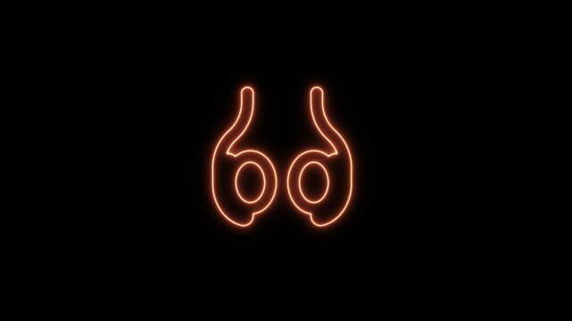 Orange glowing neon icon of a pair of testicles, isolated on a black background. Neon Icon. Neon Sign