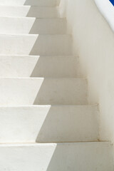 Abstract view of typical greek architecture detail of rustic outside steps to a rooftop in a...