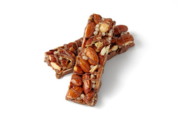 Two sweet caramel nut bars isolated on white background.