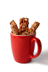 sweet chocolate nut bars in a red coffee mug.