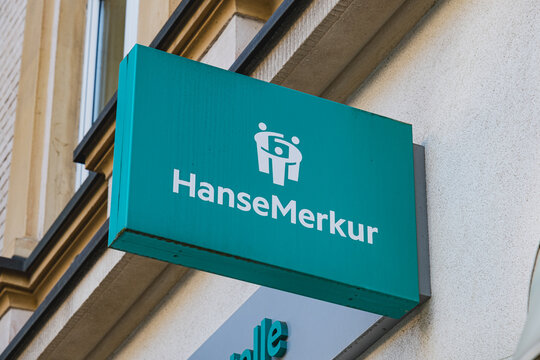 HanseMerkur insurance company logo on the exterior of a branch located in the center of Dusseldorf, Germany