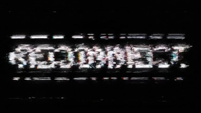 Pixelated RECONNECT text with digital distortion and VCR static effect. Perfect for network failure and connection recovery concepts - Powered by Adobe