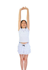 Cute young Asian girl in polka dot stretching her arms up high for stretch or exercise, isolated on...