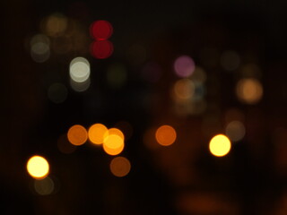 City lights bokeh FX background. City bokeh light FX on dark background. Can be used as elements, overlay or  background for design projects. 