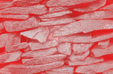 Computer-generated stonework as background.