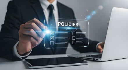Businessman reviewing corporate policies on a transparent digital interface with laptop