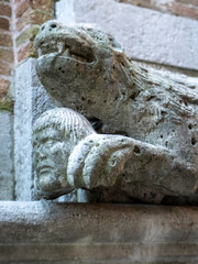 Small figure above a door in Venice.