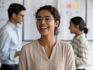Obraz premium Smiling South Asian businesswoman headshot — corporate recruitment portrait