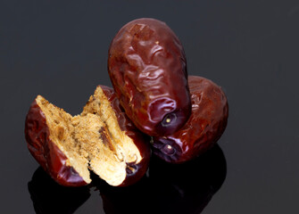 Dried jujubes, healthy food. close-up. isolated from the background. macro