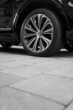 Belgrade, Serbia - May 14,2025: Bentley black car wheel and disc brakes and caliper. Low prifile tire tyre Continental WinterContact