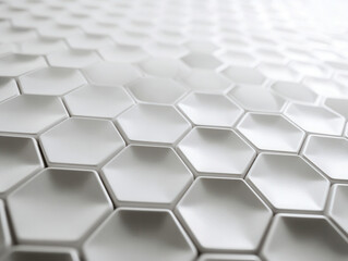 Abstract pattern of smooth white hexagonal tiles creating a modern geometric textured surface with soft lighting and subtle shadows in a minimalist design