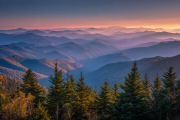 Obraz premium Stunning panoramic view of layered mountain ridges at sunset with pine trees in foreground and soft vibrant sky colors creating a tranquil natural landscape scene
