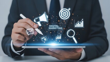 Businessman analyzing digital marketing data on a tablet with holographic icons