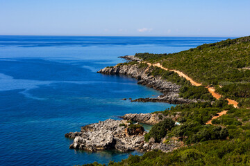 Aquarium and Guma Beaches near Himare, Albania. Sunny Albanian Riviera seascape, turquoise water, scenic coast, summer vacation concept