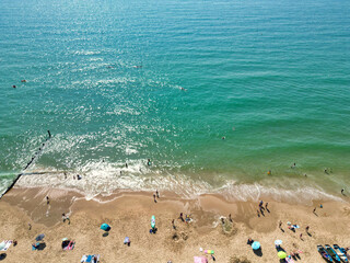 Obraz premium Aerial View of Bournemouth Beach and Ocean City of England. Aerial Footage Was Captured During Hot Sunny Day of 12th, August 2025 With Drone Camera. 