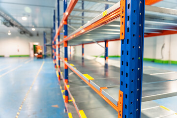 Industrial shelves for stacking and storing food products in cold storage.