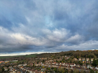 Aerial Drone Camera View of British Residential Buildings and Roads with Traffic of East Luton City Streets Aerial View of England During Evening of Winter. 25th November, 2025