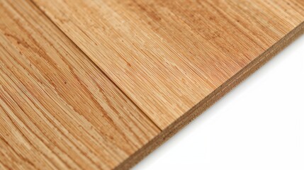 Close up view of laminated plywood, showcasing its layers and natural wood grain pattern.