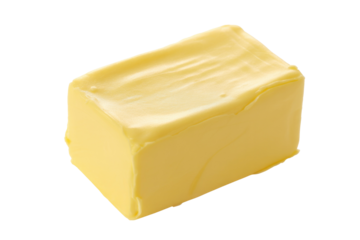 A rectangular block of rich yellow butter, slightly softened with a smooth, shiny texture on top, ready for cooking or spreading. background removed