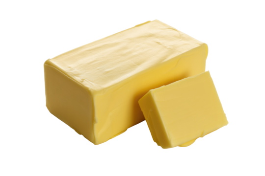 A block of rich yellow butter with a smaller cut piece, isolated on a transparent background, perfect for culinary use. background removed