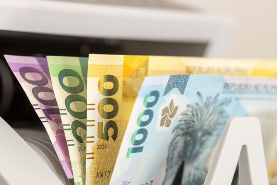 Philippine peso in a bill counter. Financial concept. Philippines money. Business background. Close up