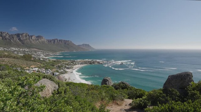 View of the Atlantic Seaboard from The Rock view site at Bantry Bay showing Clifton Beach, Camps Bay and the 12 Apostles. Cape Town. Western Cape. South Africa. 30fps footage captured in 4k 60p.