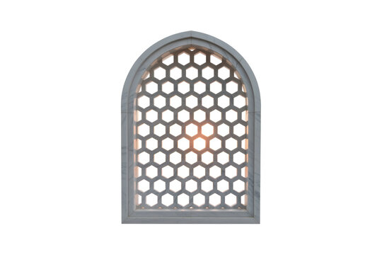 An elegant arched marble window frame featuring a decorative hexagonal pattern screen, with a subtle warm glow visible through its intricate design. background removed