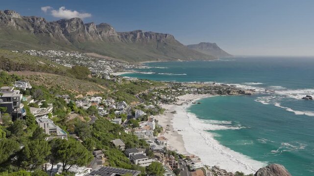 View of the Atlantic Seaboard from The Rock view site at Bantry Bay showing Clifton Beach, Camps Bay and the 12 Apostles. Cape Town. Western Cape. South Africa. 30fps footage captured in 4k 60p.
