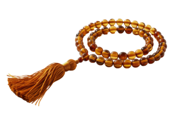 A beautiful amber-like prayer bead strand (tasbih) with a decorative tassel, featuring translucent orange-brown beads, isolated. background removed