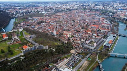 Aerial panorama view of the old town in the city Besancon in France on a cloudy afternoon in early spring.