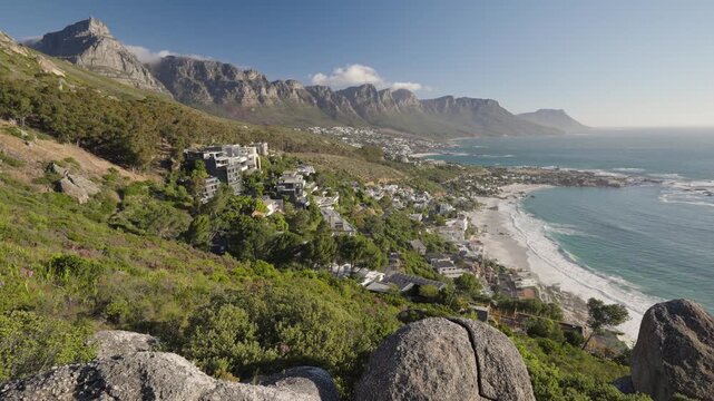 View of the Atlantic Seaboard from The Rock view site at Bantry Bay showing Clifton Beach, Camps Bay and the 12 Apostles. Cape Town. Western Cape. South Africa. 30fps footage captured in 4k 60p.