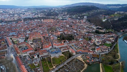 Aerial panorama view of the old town in the city Besancon in France on a cloudy afternoon in early spring.