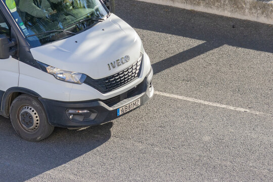 Iveco daily commercial van parked on asphalt road