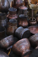 Traditional Georgian household objects displayed at Tbilisi’s Dry Bridge market, capturing cultural heritage, craftsmanship and an authentic vintage atmosphere.
