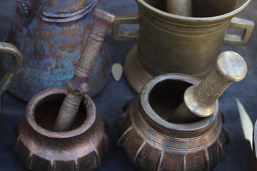A selection of copper bowls, jugs and trays displayed at Tbilisi’s Dry Bridge flea market, capturing vintage charm and historic atmosphere.
