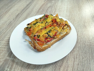 Cheesy baked vegetable toast tomatoes