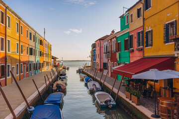 Burano Island canal with colorful houses and boats