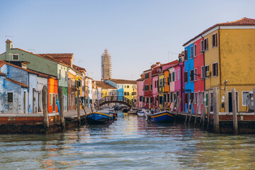 Burano canal with colorful houses and boats in Venice