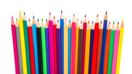A vibrant row of sharpened colored pencils in various hues, arranged in a wave-like pattern against a white background. Perfect for art supplies, creativity, and back-to-school themes.
