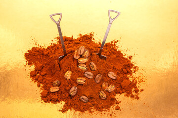 Close-up of two shovels in a pile of rich ground coffee, surrounded by whole coffee beans on a shiny gold background, perfect for coffee and agriculture themes