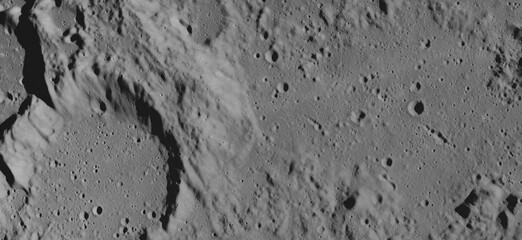 Detailed Lunar Surface Texture with Craters and Shadows from Space